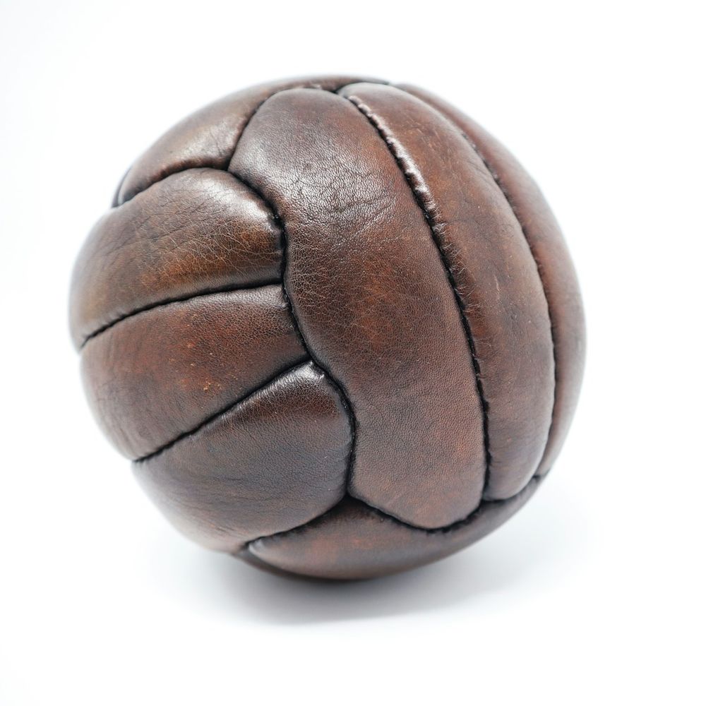 Brown stitched-panel vintage style ball on a white background