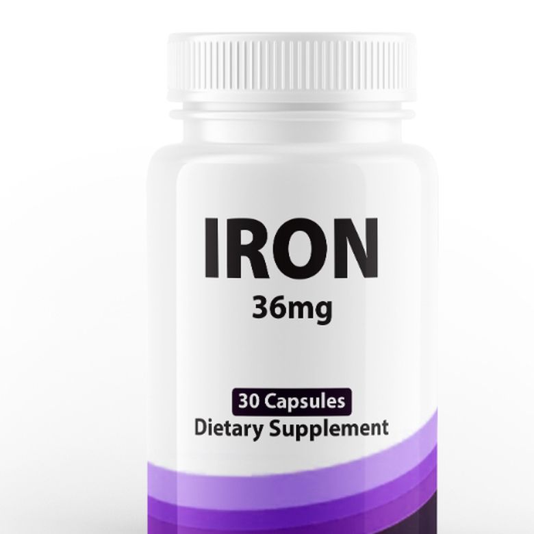 White bottle labelled Iron 36 mg, 30 capsules, dietary supplement, with a purple band